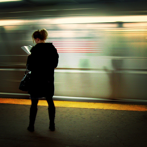 On the platform, reading