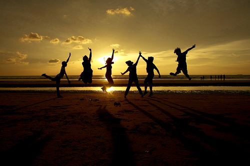 Happy Jumping Over Sunset