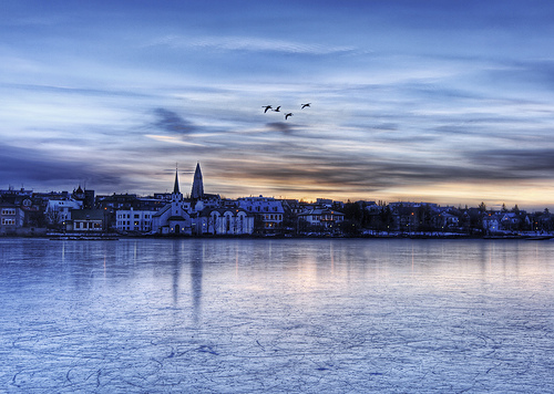 Sunrise Across The Icy Lake In Reykjavik