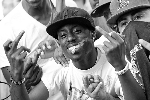 Protestors Flips Off Police Officers While Smoking